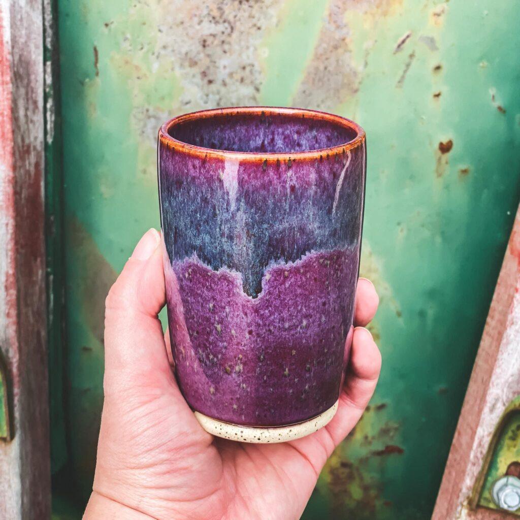 Iron Lustre over Smokey Merlot on the stoneware tumbler by Krissy Page Pottery