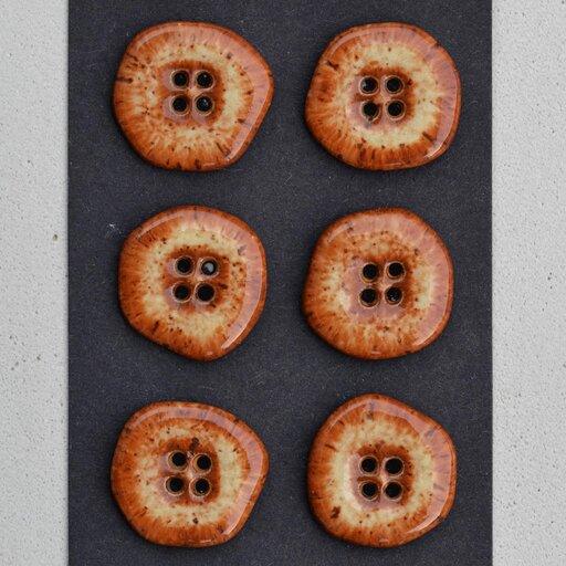 Asya Franke ceramic buttons
Albany slip brown, speckled clay, cone 6-7