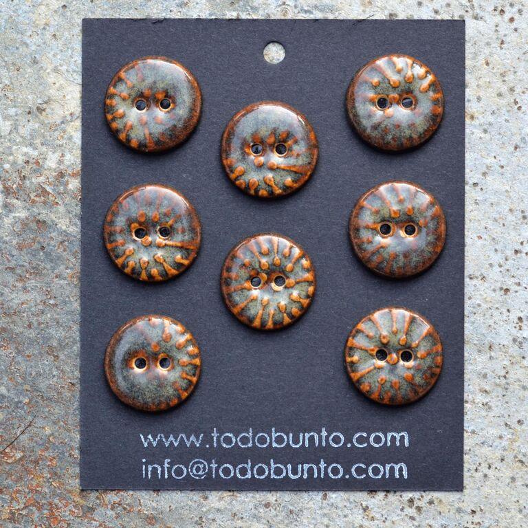 Asya Franke ceramic buttons
Iron Lustre, cone 5, white clay