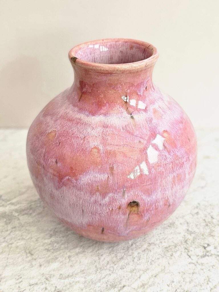 Amaryllis over Rose Quartz glaze on a stoneware vase by Craig Mealing