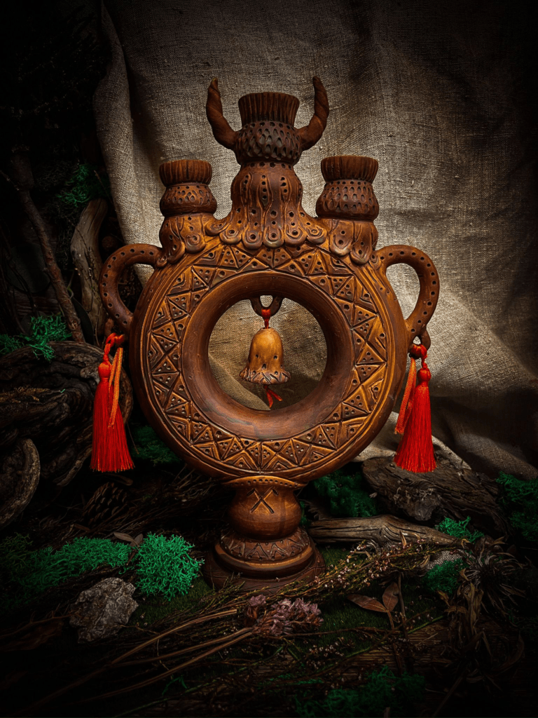 Handmade Ukrainian torus-shaped candlestick in Spanish clay, milk-fired finish